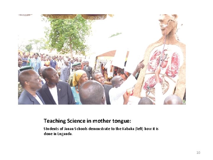 Teaching Science in mother tongue: Students of Janan Schools demonstrate to the Kabaka (left)