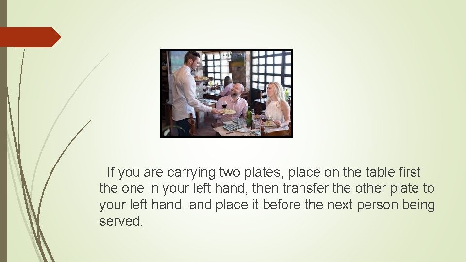 If you are carrying two plates, place on the table first the one in