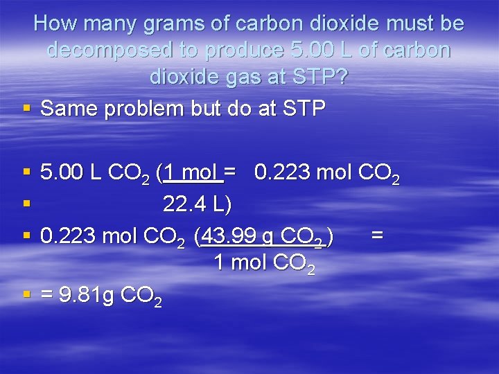 How many grams of carbon dioxide must be decomposed to produce 5. 00 L