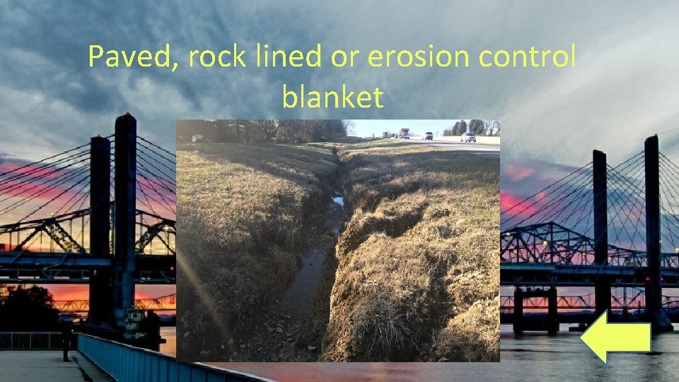 Paved, rock lined or erosion control blanket 