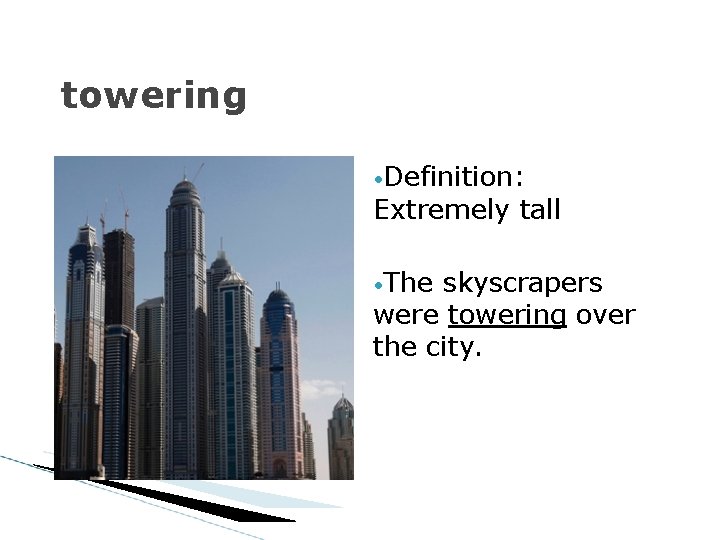 towering • Definition: Extremely tall • The skyscrapers were towering over the city. 