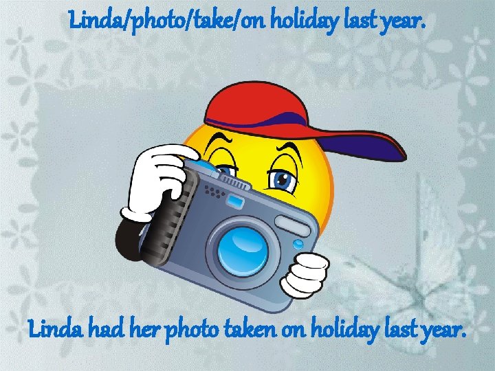 Linda/photo/take/on holiday last year. Linda had her photo taken on holiday last year. 