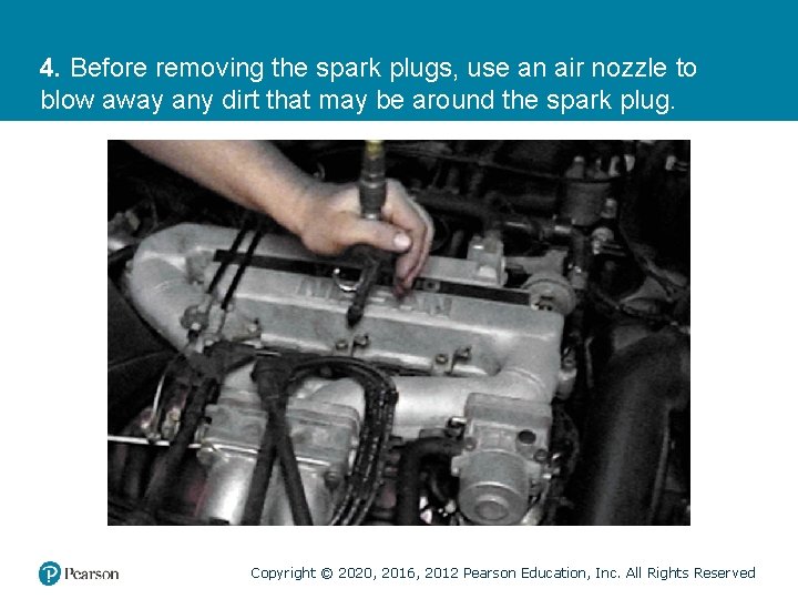 4. Before removing the spark plugs, use an air nozzle to blow away any