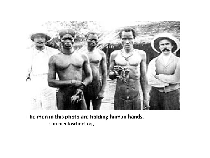 The men in this photo are holding human hands. sun. menloschool. org 