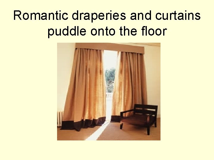 Romantic draperies and curtains puddle onto the floor 