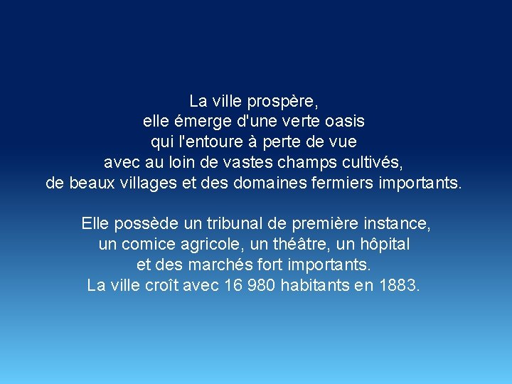 La ville prospère, elle émerge d'une verte oasis qui l'entoure à perte de vue