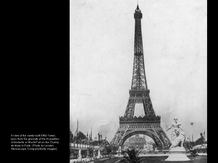 A view of the newly-built Eiffel Tower, seen from the grounds of the Exposition