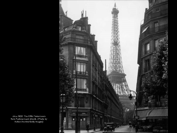 circa 1925: The Eiffel Tower seen from Parisian back streets. (Photo by Hulton Archive/Getty