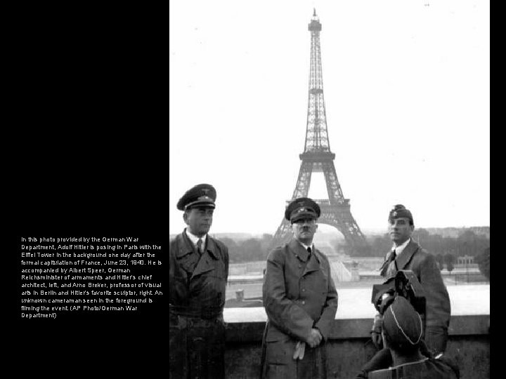 In this photo provided by the German War Department, Adolf Hitler is posing in