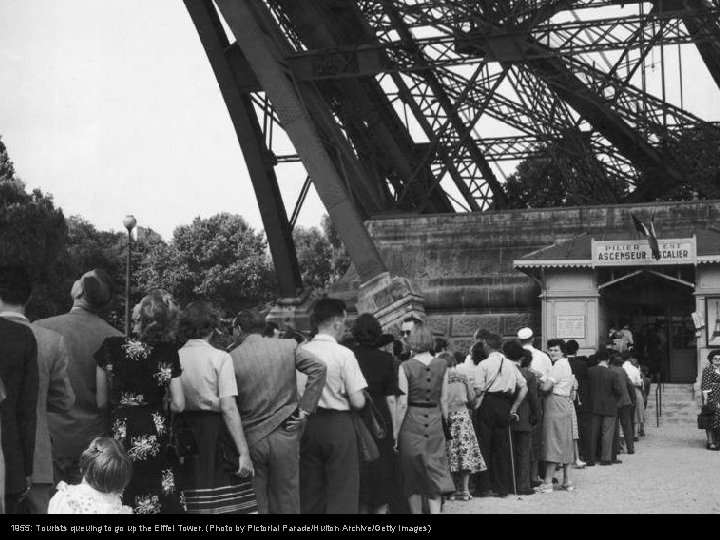 1955: Tourists queuing to go up the Eiffel Tower. (Photo by Pictorial Parade/Hulton Archive/Getty