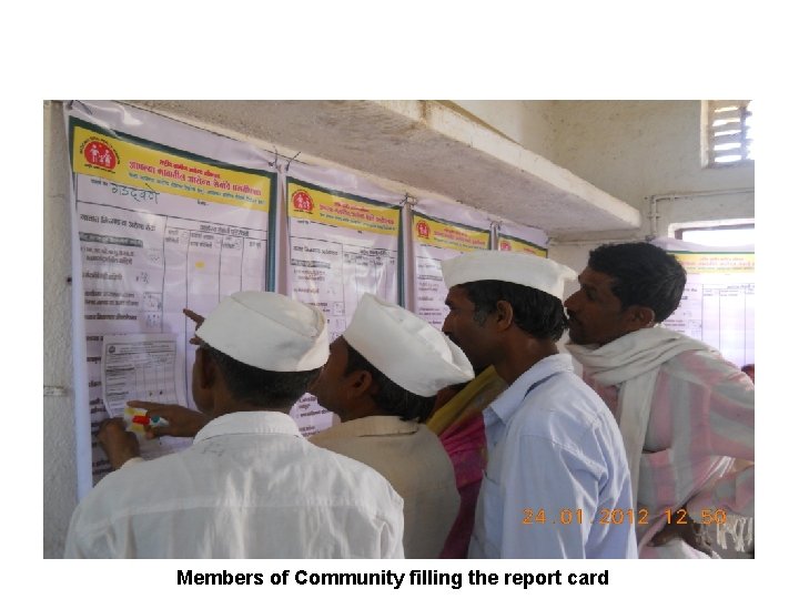 Members of Community filling the report card 