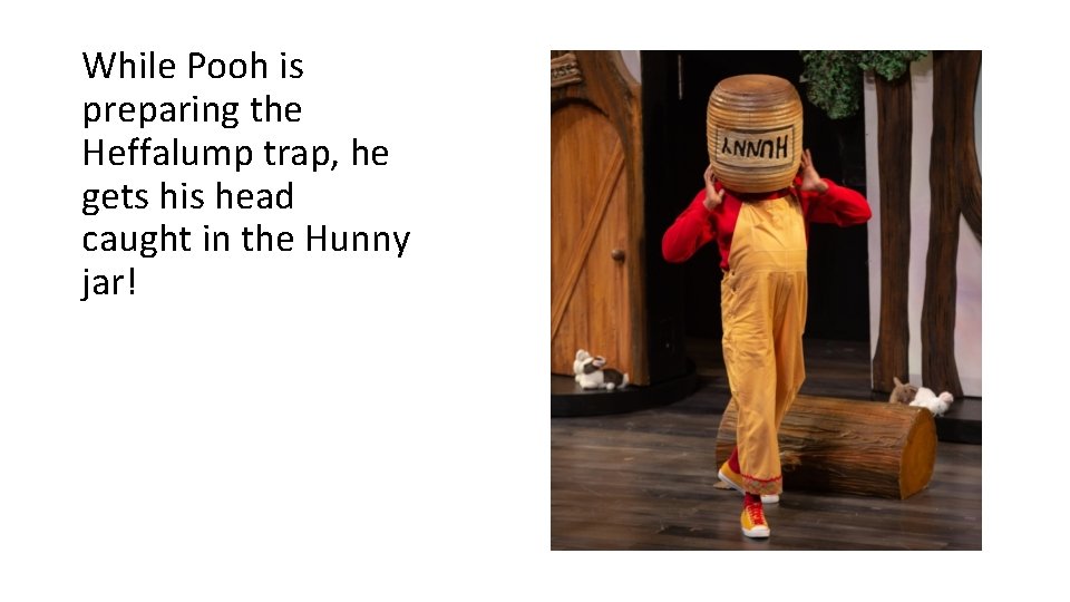 While Pooh is preparing the Heffalump trap, he gets his head caught in the While Pooh is preparing the Heffalump trap, he gets his head caught in the