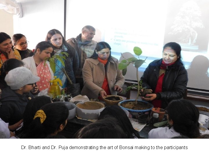 Dr. Bharti and Dr. Puja demonstrating the art of Bonsai making to the participants