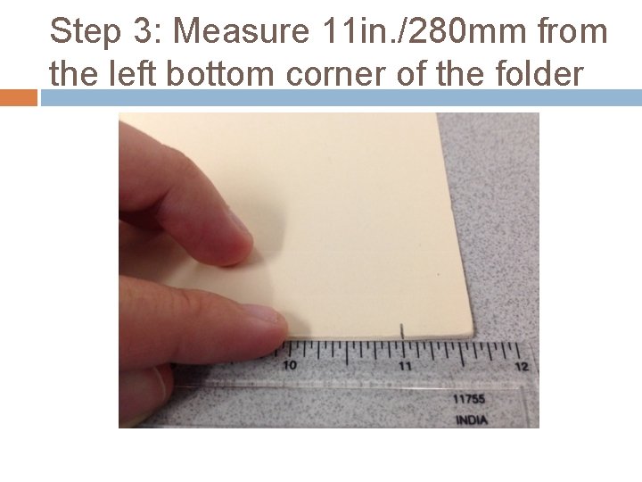 Step 3: Measure 11 in. /280 mm from the left bottom corner of the