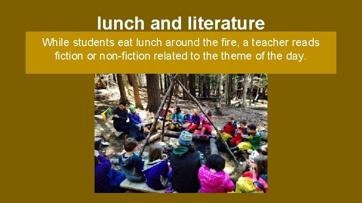 lunch and literature While students eat lunch around the fire, a teacher reads fiction