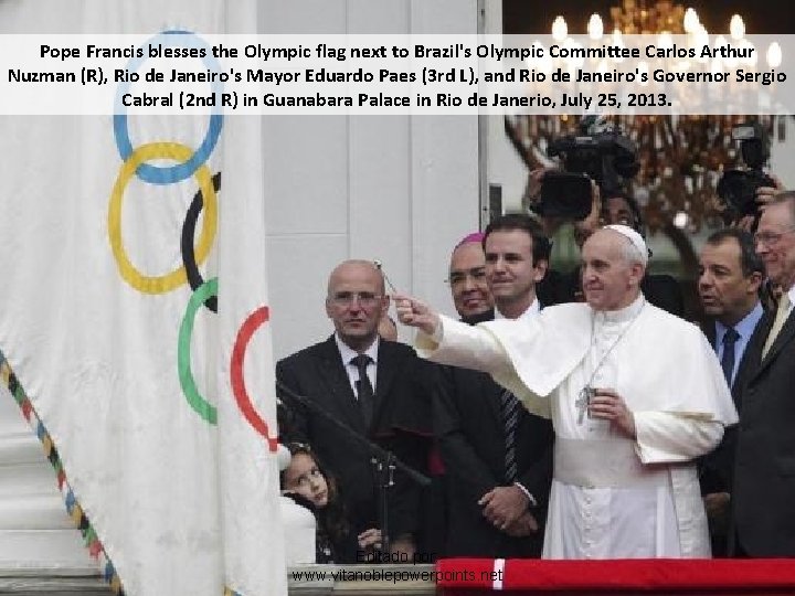 Pope Francis blesses the Olympic flag next to Brazil's Olympic Committee Carlos Arthur Nuzman