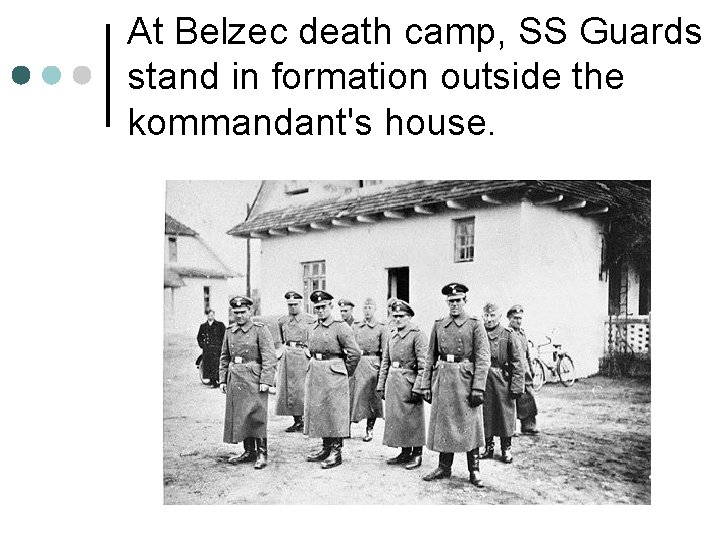 At Belzec death camp, SS Guards stand in formation outside the kommandant's house. 