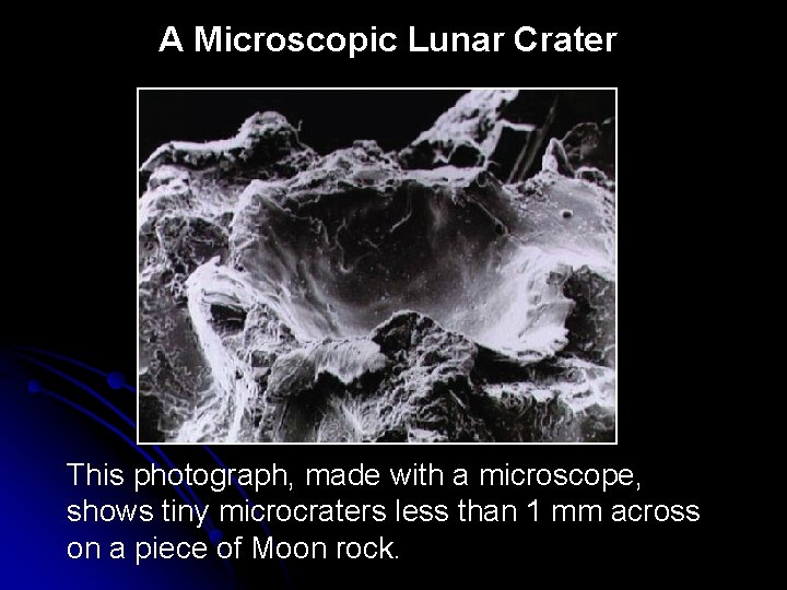 A Microscopic Lunar Crater This photograph, made with a microscope, shows tiny microcraters less