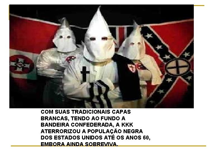 COM SUAS TRADICIONAIS CAPAS BRANCAS, TENDO AO FUNDO A BANDEIRA CONFEDERADA, A KKK ATERRORIZOU