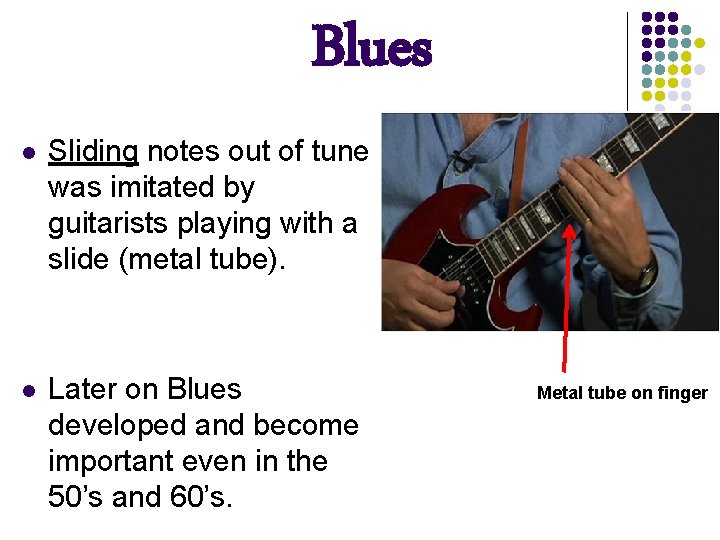 Blues l Sliding notes out of tune was imitated by guitarists playing with a