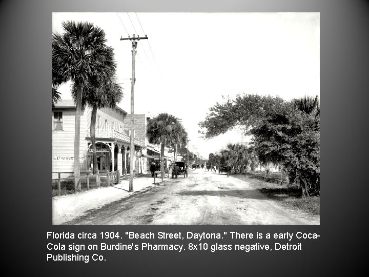 Florida circa 1904. "Beach Street, Daytona. " There is a early Coca. Cola sign