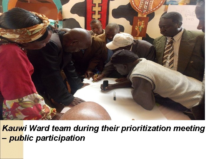 Kauwi Ward team during their prioritization meeting – public participation 