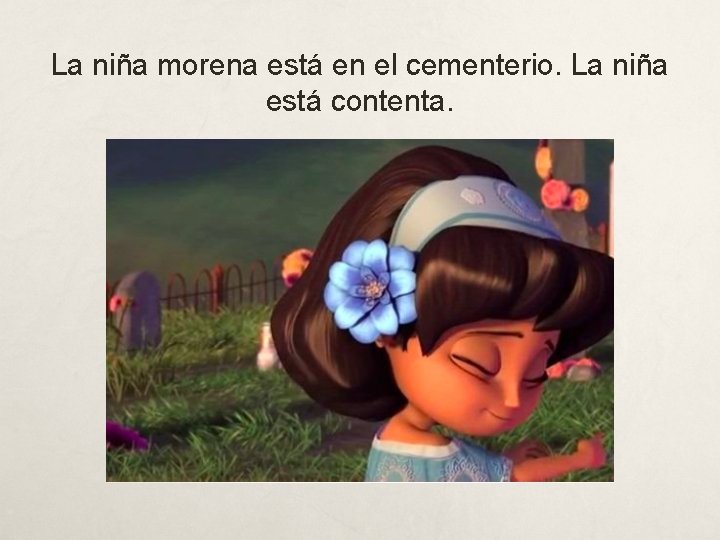 La niña morena está en el cementerio. La niña está contenta. 