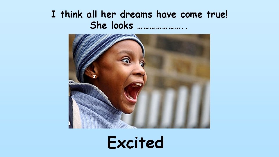 I think all her dreams have come true! She looks …………………. . Excited 