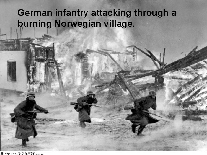 German infantry attacking through a burning Norwegian village. 