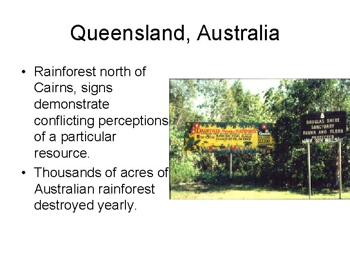 Queensland, Australia • Rainforest north of Cairns, signs demonstrate conflicting perceptions of a particular