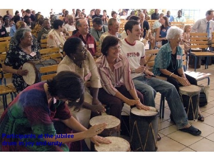 Participants at the jubilee drum in joy and unity. 