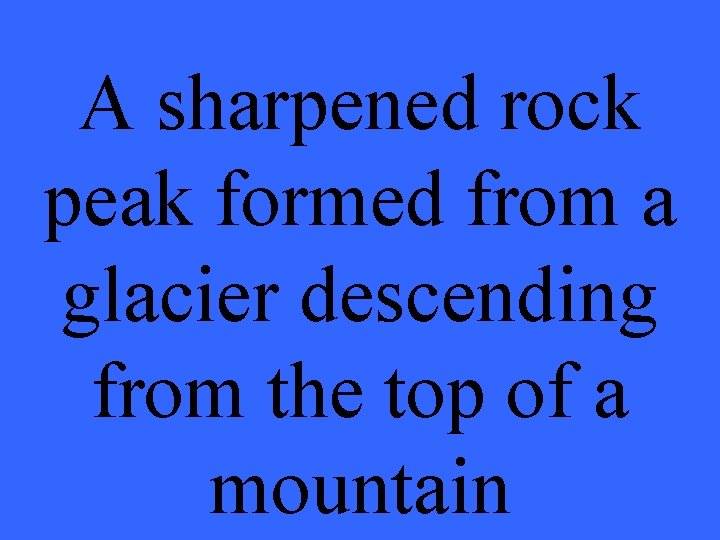 A sharpened rock peak formed from a glacier descending from the top of a