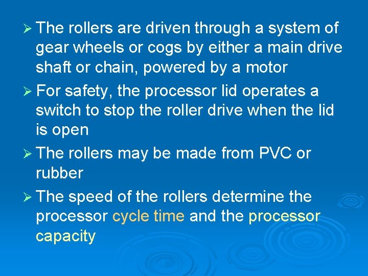 Ø The rollers are driven through a system of gear wheels or cogs by