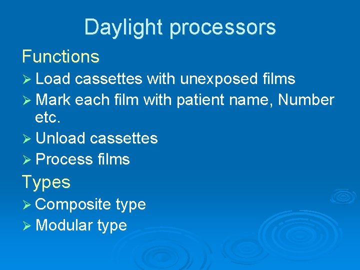 Daylight processors Functions Ø Load cassettes with unexposed films Ø Mark each film with