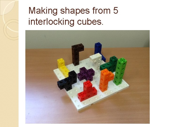 Making shapes from 5 interlocking cubes. 