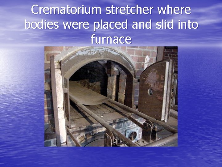 Crematorium stretcher where bodies were placed and slid into furnace 