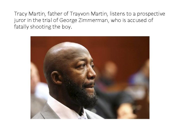 Tracy Martin, father of Trayvon Martin, listens to a prospective juror in the trial