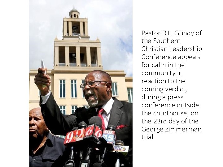 Pastor R. L. Gundy of the Southern Christian Leadership Conference appeals for calm in