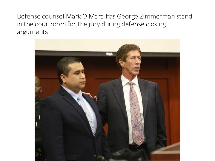 Defense counsel Mark O'Mara has George Zimmerman stand in the courtroom for the jury