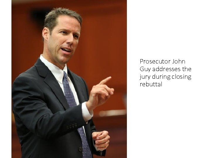 Prosecutor John Guy addresses the jury during closing rebuttal 