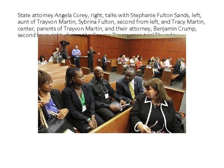 State attorney Angela Corey, right, talks with Stephanie Fulton Sands, left, aunt of Trayvon