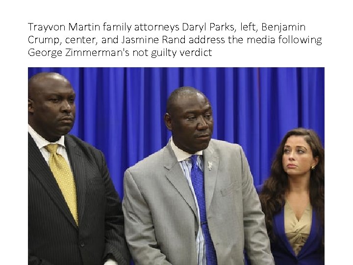 Trayvon Martin family attorneys Daryl Parks, left, Benjamin Crump, center, and Jasmine Rand address