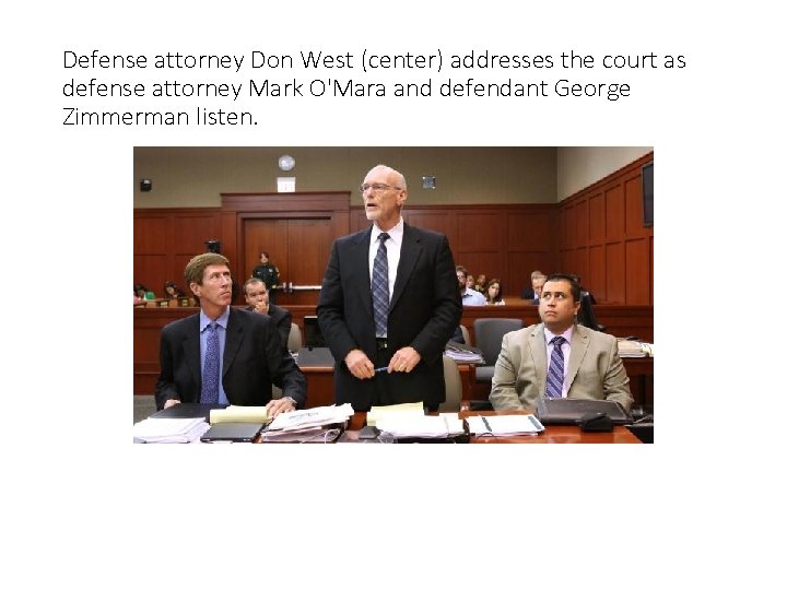 Defense attorney Don West (center) addresses the court as defense attorney Mark O'Mara and