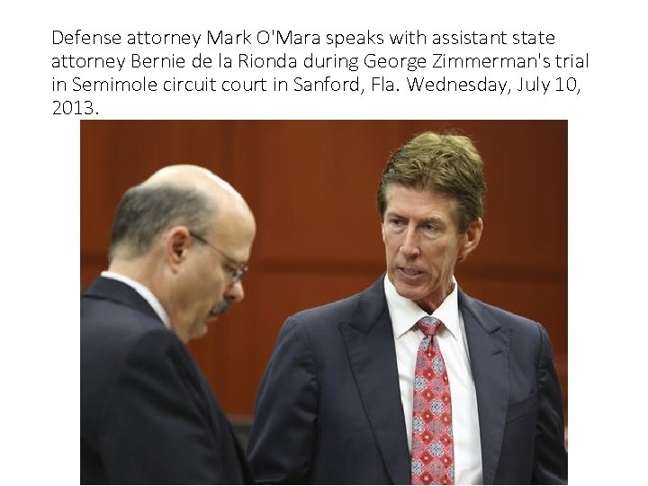 Defense attorney Mark O'Mara speaks with assistant state attorney Bernie de la Rionda during