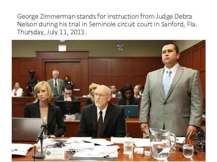 George Zimmerman stands for instruction from Judge Debra Nelson during his trial in Seminole