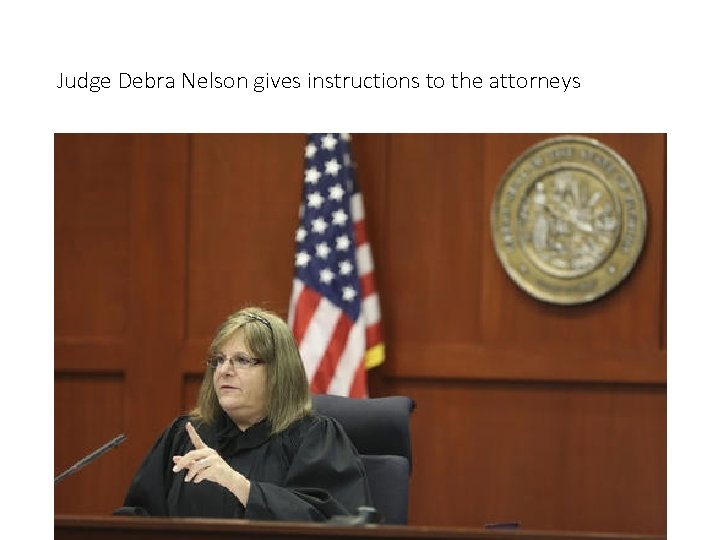 Judge Debra Nelson gives instructions to the attorneys 