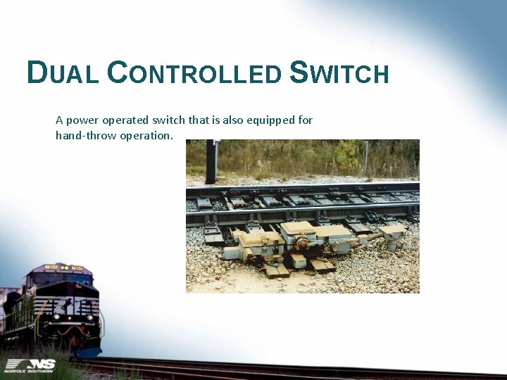 DUAL CONTROLLED SWITCH A power operated switch that is also equipped for hand-throw operation.