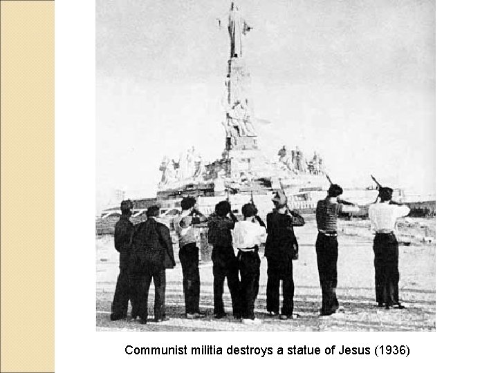 Communist militia destroys a statue of Jesus (1936) 