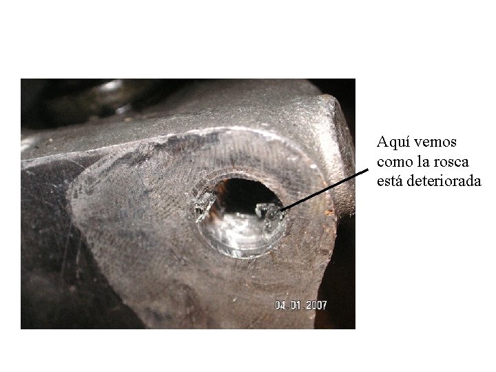 Aquí vemos como la rosca está deteriorada 