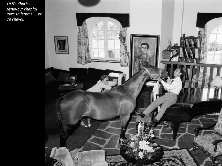 1970. Charles Aznavour chez lui avec sa femme. . et un cheval. 1970. Charles Aznavour chez lui avec sa femme. . et un cheval.
